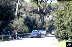 Silvia, Cherin, Giulia, from Nigeria, work in the Castel Porziano wood, in the outskirts of Rome, Feb. 27, 2018. Nigerian teenagers and young women selling sex is a common sight for motorists in Italy.