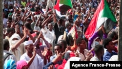 Sudanese demonstrators rally in al-Daim neighborhood in the capital Khartoum, Jan. 2, 2022, amid calls for pro-democracy rallies in "memory of the martyrs" killed in recent protests.