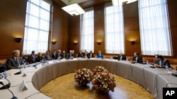 General view prior to the start of the two days of closed-door nuclear talks on Tuesday, Oct. 15, 2013 in Geneva. 