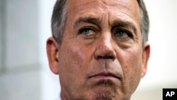 Ketua Dewan Perwakilan Rakyat John Boehner dari Partai Republik pada konferensi pers menyusul sidang DPR (30/9). (AP/Evan Vucci)