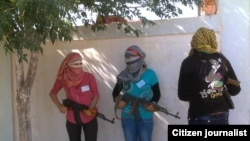 Şervanên Kurd yên jin bajarê Kobanê diparêzin