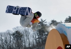 Red Gerard, of the United States, jumps during the men's slopestyle final at Phoenix Snow Park at the 2018 Winter Olympics in Pyeongchang, South Korea, Sunday, Feb. 11, 2018. (AP Photo/Kin Cheung)