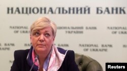 Valeria Hontareva, head of Ukraine's central bank, is seen at a news conference in Kyiv Dec. 30, 2014. (REUTERS/Konstantin Grishin )