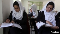 Girls are seen attending class in Kabul (FILE).