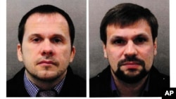 This combination photo made available by the London Metropolitan Police Sept. 5, 2018, shows Alexander Petrov, left, and Ruslan Boshirov. 