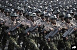 Commandos march across the Kim Il Sung Square during a military parade in Pyongyang, North Korea, to celebrate the 105th birth anniversary of Kim Il Sung, the country's late founder, April 15, 2017.