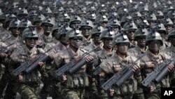 Commandos march across the Kim Il Sung Square during a military parade in Pyongyang, North Korea, to celebrate the 105th birth anniversary of Kim Il Sung, the country's late founder, April 15, 2017.