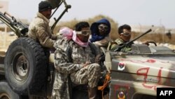 Kryengritësit libianë vënë kushte për armëpushim me disa kushte për Gadafin