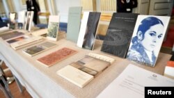 Books of American poet Louise Gluck during the announcement of 2020 Nobel Prize in literature at Borshuset in Stockholm, October 8, 2020. Gluck won the prize. (TT News Agency/Henrik Montgomery/via REUTERS)