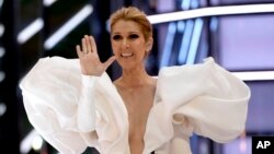 FILE - Celine Dion performs "My Heart will Go On" at the Billboard Music Awards at the T-Mobile Arena, May 21, 2017, in Las Vegas. 