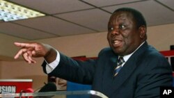 Zimbabwean PM and MDC President Morgan Tsvangirai speaks during a press conference in Harare following the arrest of Energy minister and MDC member, Elton Mangoma, March 10, 2011