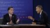 President Barack Obama, right, and Republican presidential nominee Mitt Romney discuss a point during the third presidential debate at Lynn University in Boca Raton, Florida, October 22, 2012.