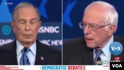 Ứng cử viên Dân chủ Michael Bloomberg và Bernie Sanders.