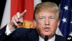 Republican presidential candidate Donald Trump speaks to supporters during a campaign stop, Oct. 23, 2015 in Doral, Fla. 