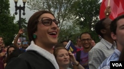 People celebrate Supreme Court ruling on Same Sex Marriage in front of the Supreme Court in Washington, D.C., June 26, 2015. (Photo: M. Burke / VOA)