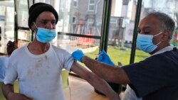 Virus Outbreak Britain Vaccinating the Homeless