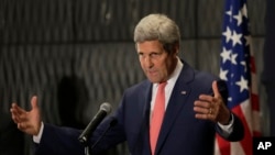 FILE - U.S. Secretary of State John Kerry talks during a press conference in Cairo, Sept. 13, 2014. 