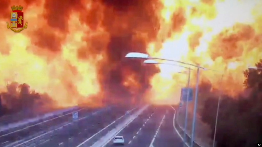 In this frame grab taken from a video released by the Italian police, the moment a truck that was transporting flammable substances explodes after colliding with another truck on a highway on the outskirts of Bologna, Aug. 6, 2018.