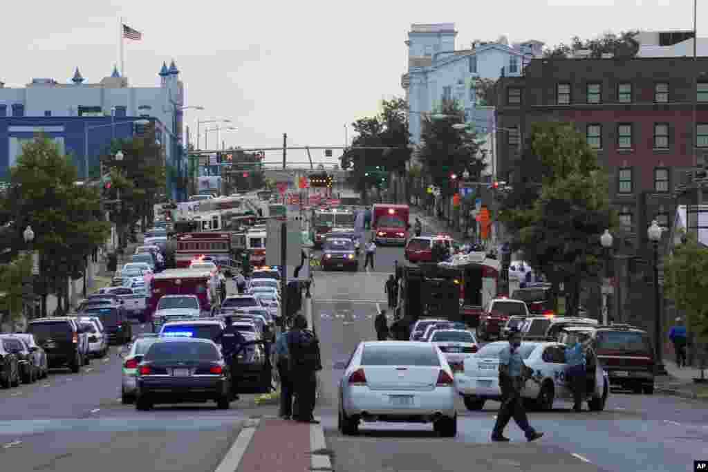 Police work the scene after a gunman was reported at the Washington Navy Yard in Washington, Sept. 16, 2013. 