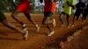 FILE: Athletes exercise in the early morning in the sports ground of the University of Eldoret in western Kenya, March 21, 2016. 