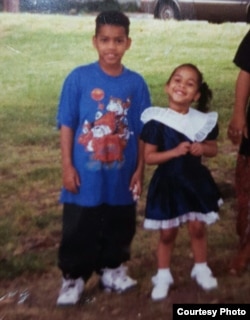 Mickel Mesa, 10, with his sister Genesis, 4, in Passaic Park, New Jersey, the first city the family lived after moving from the Dominican Republic in April 1994.