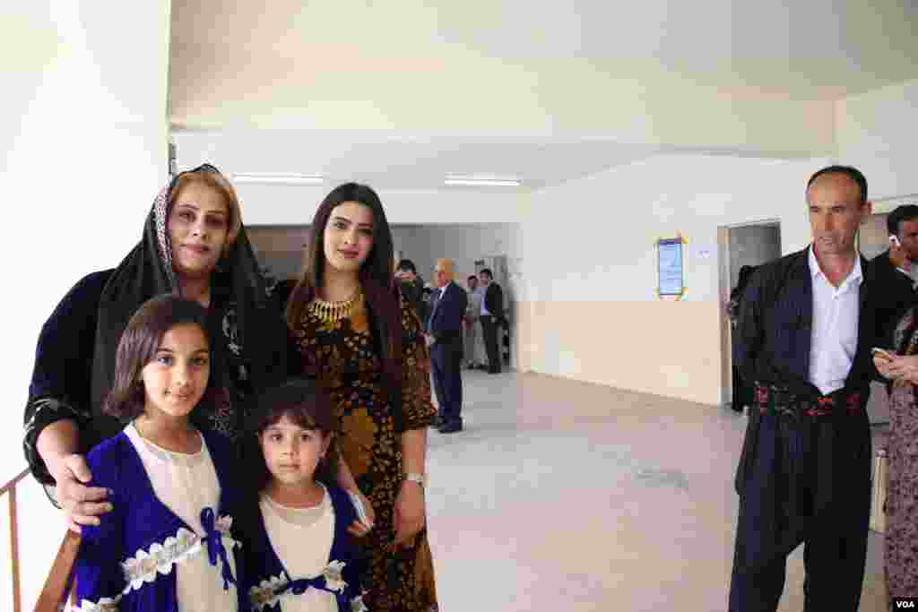 Payman Salih, her daughters and her husband, Sanger Abuzaid, say they hope the vote will signify an abrupt change in government policies impacting their region, May 12, 2018, in Irbil, Kurdistan Region, Iraq. (H. Murdock/VOA)
