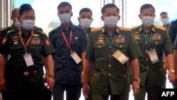 Myanmar's Military Commander-in-Chief Senior General Min Aung Hlaing (2nd R), Vice Senior General Soe Win (R) and Home Affairs Minister Lieutenant General Soe Htut (L) attend the opening ceremony of the 4th Union Peace Conference (21st Century Panglong) a