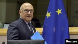 French Minister of Finance Michel Sapin arrives at the committee on economic and monetary affairs in Brussels, Belgium, May 7, 2015. 