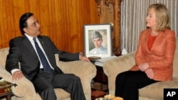 In this picture released by Pakistan's Press information agency, U.S. Secretary of State Hillary Rodham Clinton meets President of Pakistan Asif Ali Zardari in Islamabad, Pakistan, May 27, 2011.