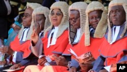 FILE: Judges are seen during the inauguration ceremony of Zimbabwean President Emmerson Mnangagwa, at the National Sports Stadium in Harare, Sunday, Aug. 26, 2018. (AP Photo/Tsvangirayi Mukwazhi)