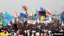 FILE - Supporters of Congolese political parties attend a joint opposition rally in Kinshasa, Democratic Republic of Congo, Sept. 29, 2018. 