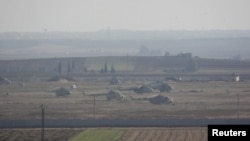 Máy bay trực thăng của lực lượng trung thành với Tổng thống Syria tại một căn cứ quân sự ở Taftanaz gần phía bắc tỉnh Idlib.