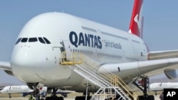 In this July 6, 2020, file photo, a Qantas Airbus A380 arrives at Southern California Logistics Airport in Victorville, Calif. Qantas Chief Executive Alan Joyce, Australia's largest airline, said that once a virus vaccine becomes widely available, his car