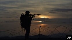 A Pakistani border security guard stands alert at Pakistan-Afghanistan border post, Chaman in Pakistan, May 5, 2017. The U.S. recently decided to withhold $50 million in military aid to Pakistan for failing to do enough against the Haqqani network.