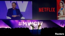 Netflix's Chief Executive Officer Reed Hastings delivers his keynote speech during Mobile World Congress in Barcelona, Spain, Feb. 27, 2017. 