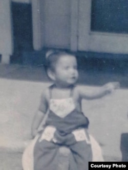 Photo of Conrad Eagle Feather, Sincangu Lakota, about age two, taken before he was removed from the family and adopted by a non-Native American family in neighboring Nebraska. Courtesy, Conrad Eagle Feather.