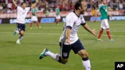 United States' Landon Donovan celebrates his goal against Mexico during the second half of a World Cup qualifying soccer match Sept. 10, 2013, in Columbus, Ohio. 