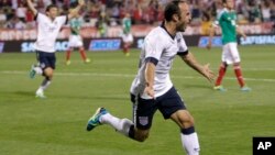 United States' Landon Donovan celebrates his goal against Mexico during the second half of a World Cup qualifying soccer match Sept. 10, 2013, in Columbus, Ohio. 