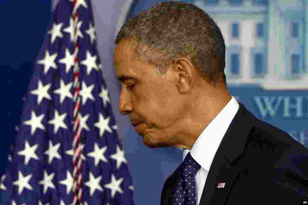 President Barack Obama leaves the podium after speaking in the press briefing room at the White House, April 15, 2013, following the explosions.