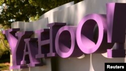 FILE - The Yahoo logo is shown at the company's headquarters in Sunnyvale, California, April 16, 2013. An August 2013 data breach exposed information held in more than 1 billion Yahoo user accounts, the company said Wednesday. 