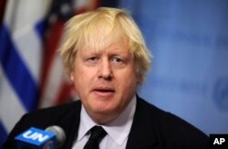 FILE - Boris Johnson speaks at United Nations Headquarters during a meeting of the UN Security Council, March 23, 2017.