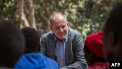 UN Special Representative to the Secretary General and head of UNMISS David Shearer speaks to former child soldiers during their release ceremony in Yambio, South Sudan, on Feb. 7, 2018.