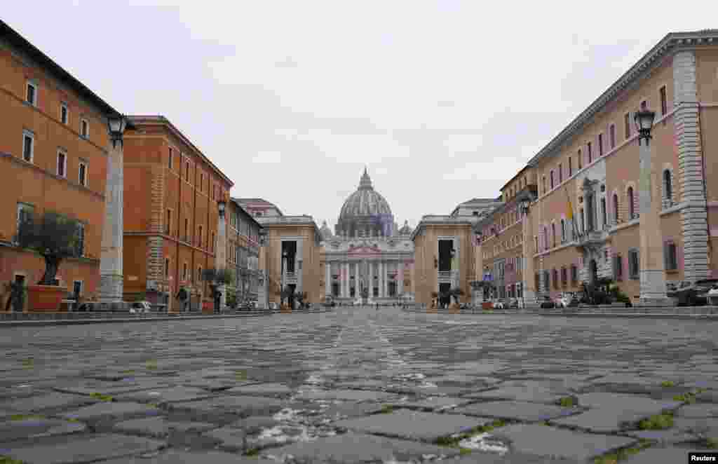 A view of St. Peter&#39;s Square, on the fourth day of an unprecedented lockdown across of all Italy imposed to slow the outbreak of coronavirus, as seen from Rome, Italy.