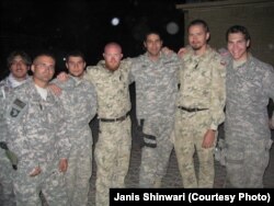 Janis Shinwari (third from right), an Afghan special immigrant visa recipient and co-founder of No One Left Behind, served as a translator for the U.S. military.