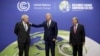 جوبایدن رئیس جمهوری آمریکا، بوریس جانسون نخست وزیر بریتانیا،‌ و آنتونیو گوترش دبیرکل سازمان ملل متحد، در کنفرانس اقلیمی گلاسگو (دوشنبه ۱۰ آبان) 