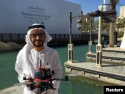 Emirati Ph.D student Talib alHinai poses with the drone prototype he and his classmates at Imperial College London built, which won a prize at state-sponsored "Drones for Good" competition, in Dubai, UAE, Feb. 10, 2016.