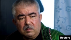FILE - Then Afghan general Abdul Rashid Dostum is seen during an interview in Shibergan, northern Afghanistan, Aug. 19, 2009. 