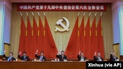 Members of the Standing Committee of the Political Bureau of the Communist Party of China (CPC) Central Committee including Chinese President Xi Jinping, center, and Premier Li Keqiang, third right.