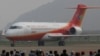 中国制造的ARJ21客机在珠海航展试飞表演后着陆（2010年11月16日）