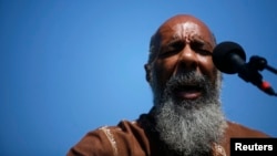 Richie Havens reprises his 1969 performance of "Freedom" at the site of the original Woodstock Music Festival in Bethel, New York, August 14, 2009.